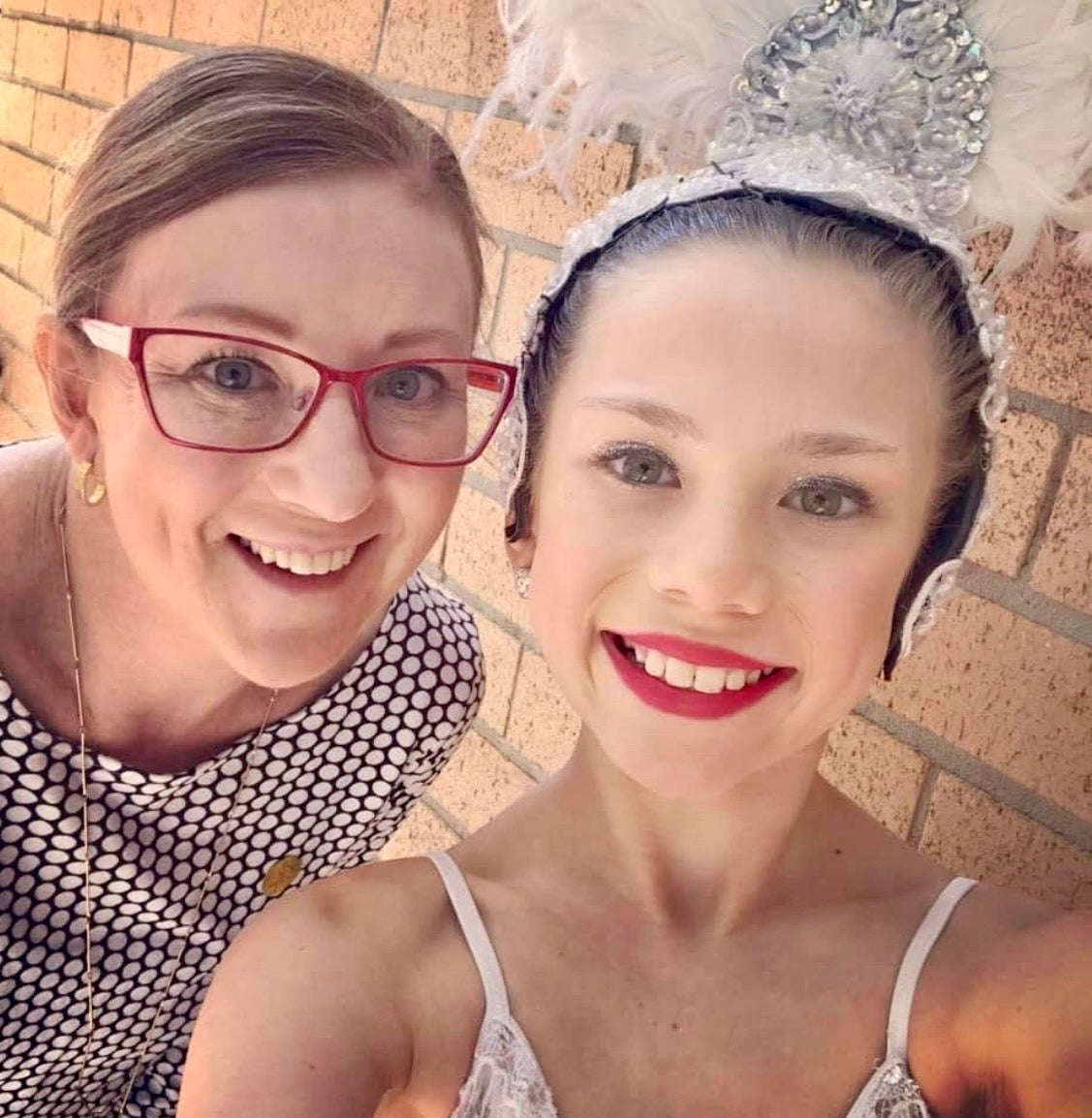 Dance mum with her dancer at a local eisteddfod