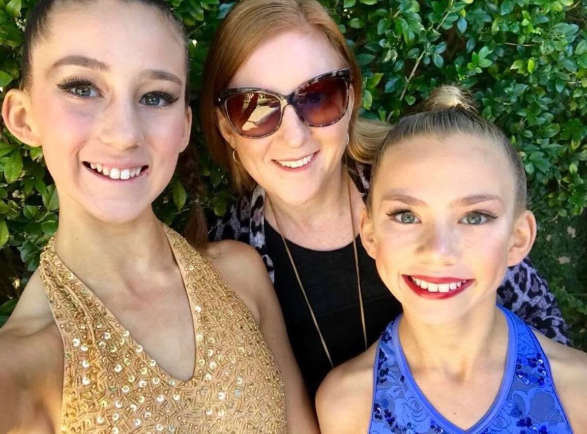 Dance Mum with two dancers in dancewear