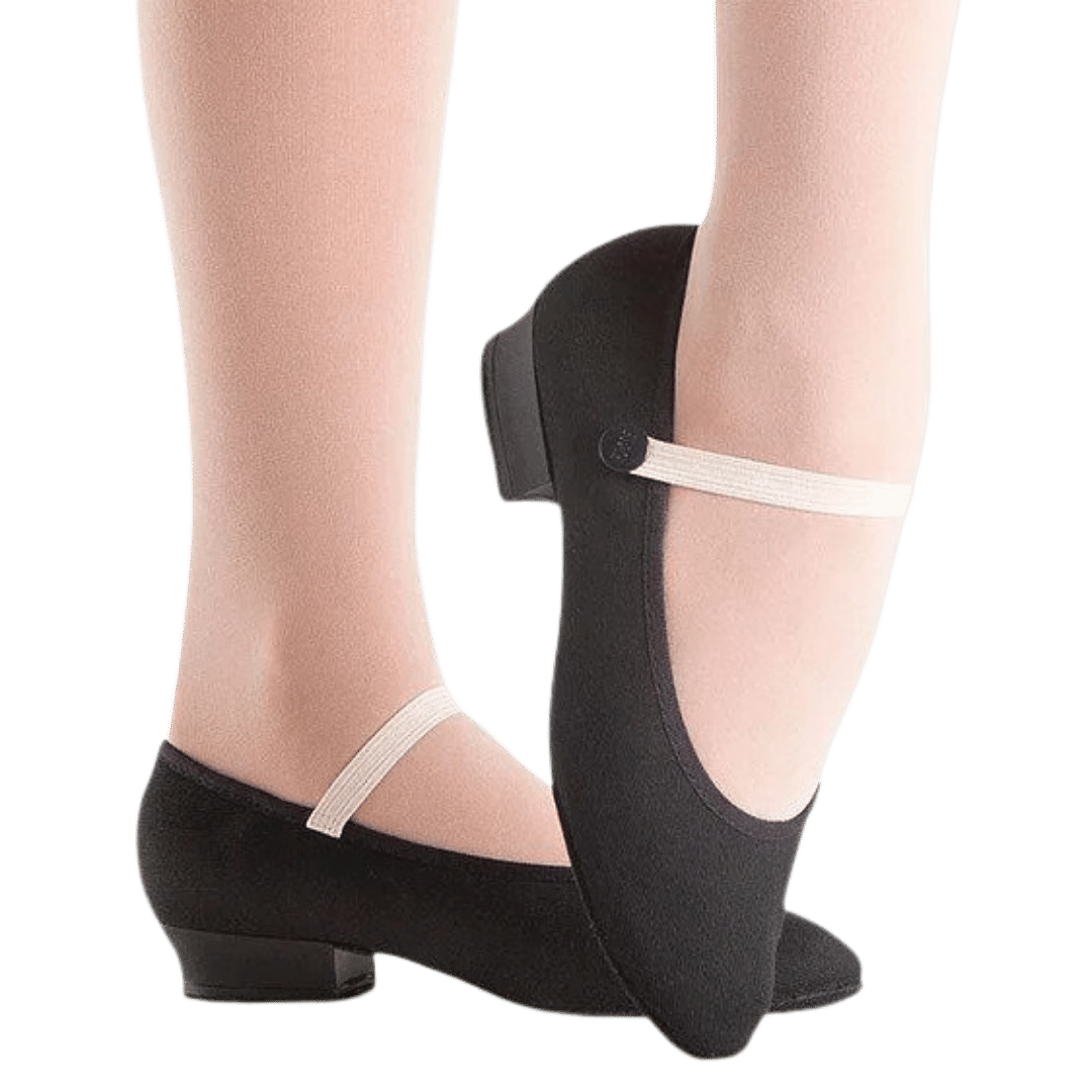 Legs in Ballet Pink Tights and Flat Heel Character Shoes in Black