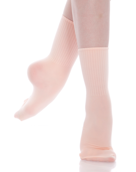 Dancer's legs wearing a pair of pink ballet socks