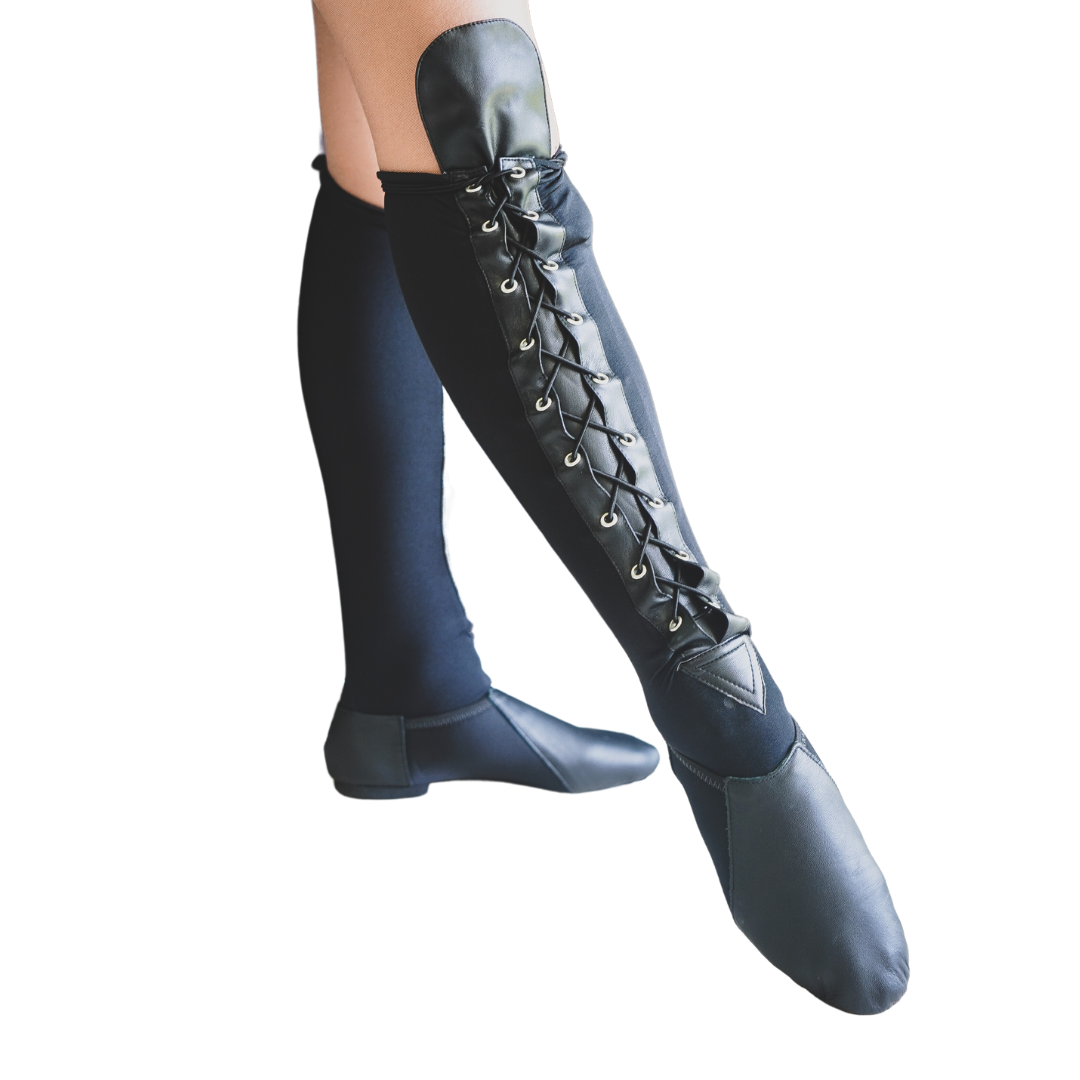 Pair of legs wearing lace up spats and black jazz shoes