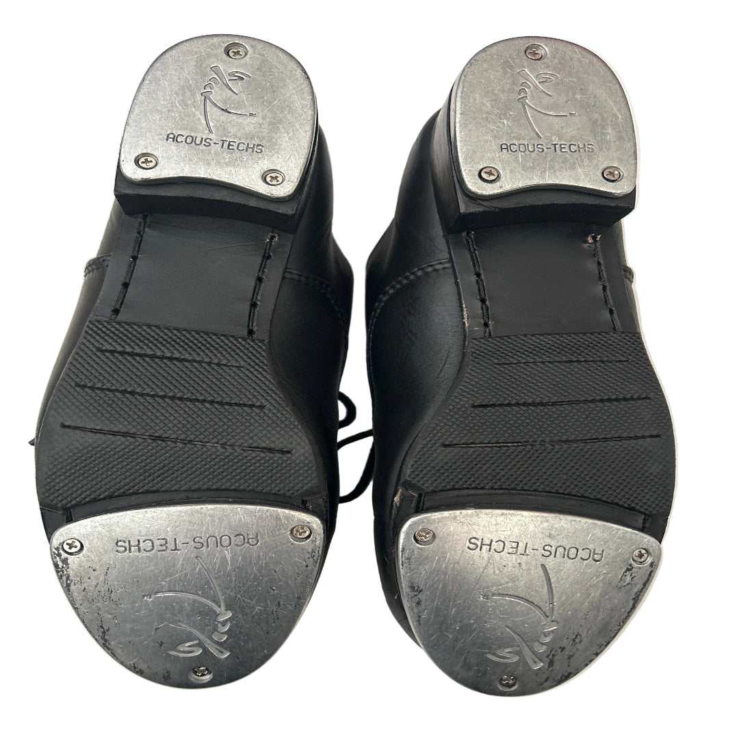 Bottom view of a pair of Slick Oxford Tap Shoes on a white background.