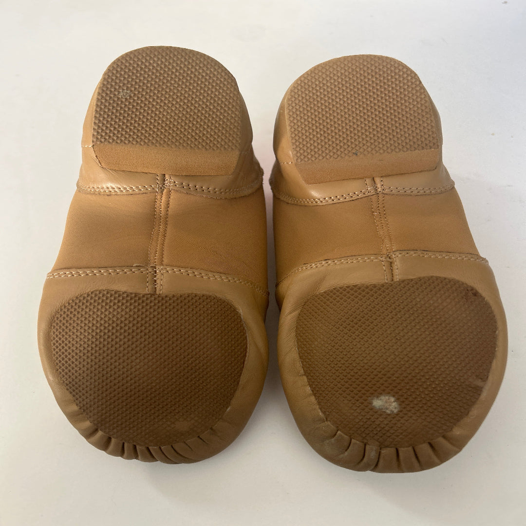 A pair of Weissman Tan Leather Jazz Shoes, view from the bottom