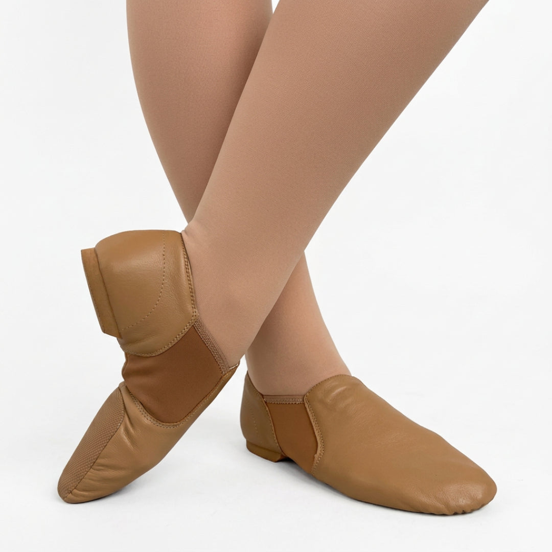 Dancer wearing tan tights and tan jazz shoes