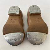 Bottom view of a pair of So Danca Tan Buckle Tap Shoes
