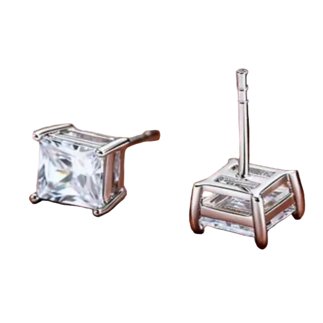 A pair of square princess-cut clear gemstone stud earrings in silver-tone settings, with one earring shown front-facing and the other angled to show the post and back.