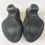 Rear view of a pair of second hand Bloch Character Shoes in size 7.5