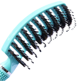 Mint coloured detangling hairbrush with black bristles