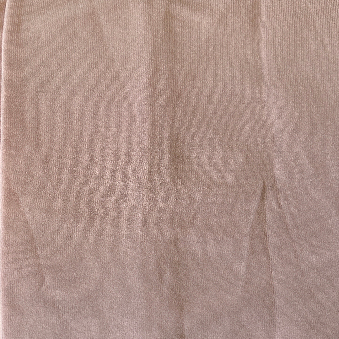 A pair of ballet pink tights close up in an attempt to show the actual colour