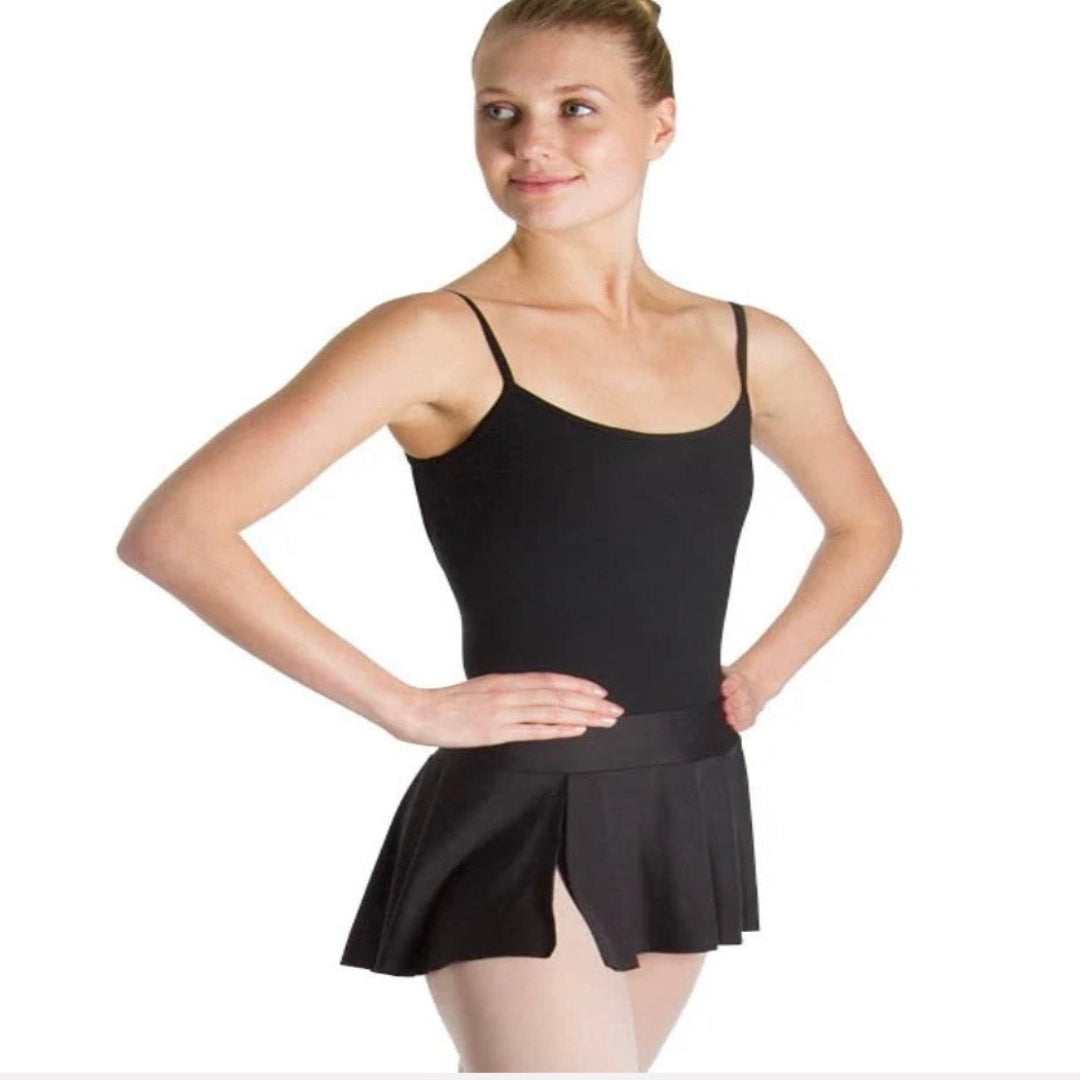 A woman modeling a black ballet skirt, posed against a plain white background.