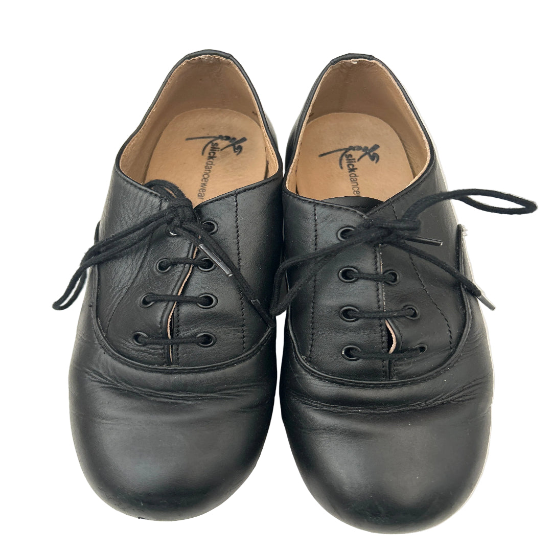 A pair of Slick Oxford Tap Shoes on a white background.