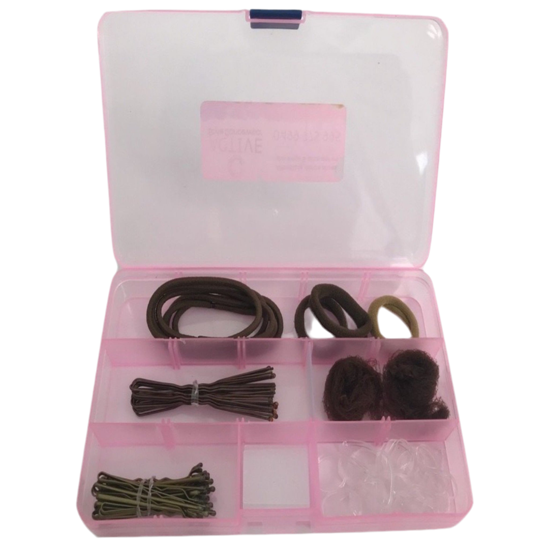 Pink hairbox with brown hair essentials for dance.