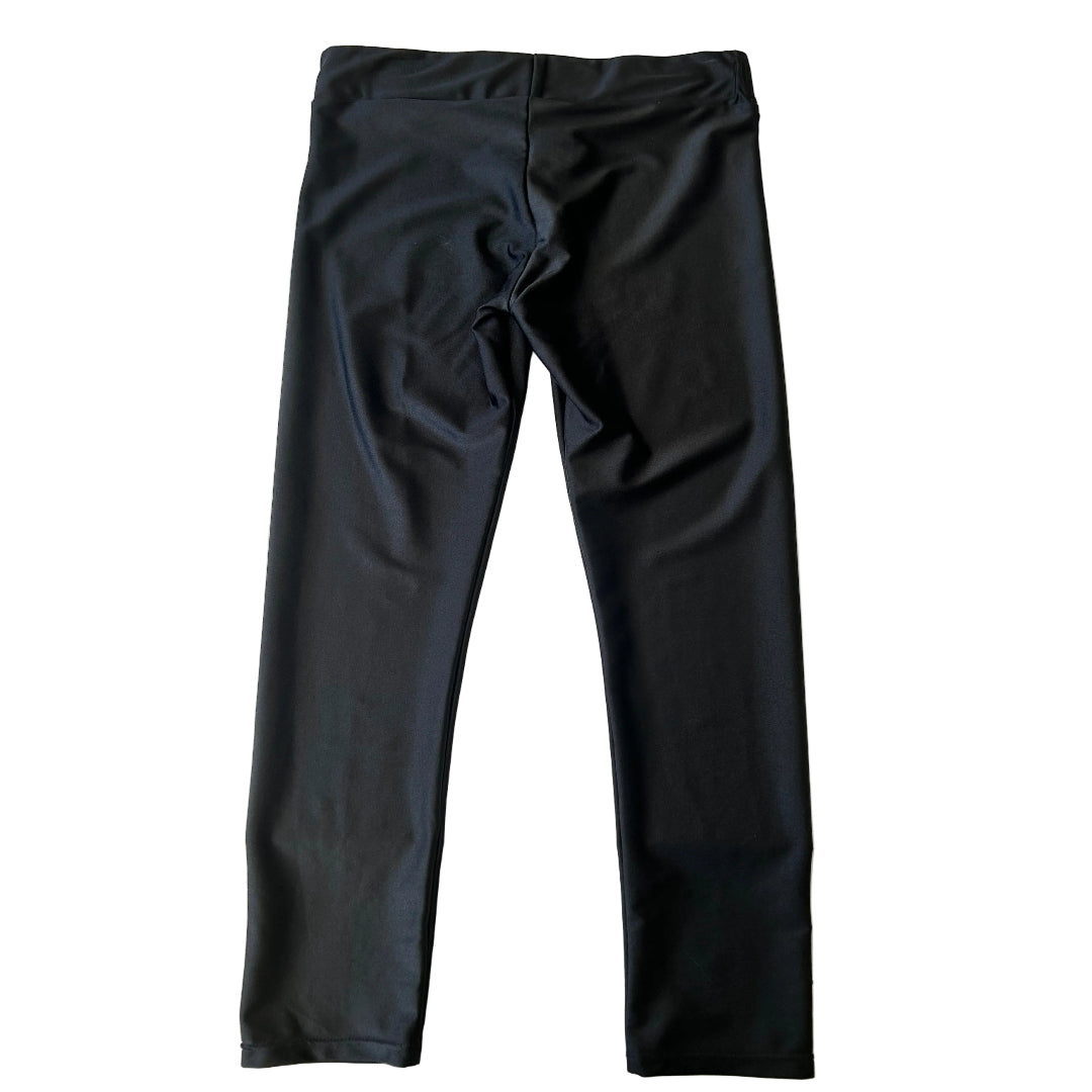 A pair of women's sleek look black leggings on a white background