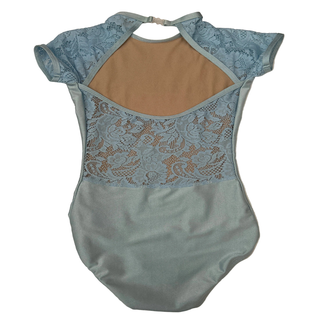 Rear view of a light blue leotard with short sleeves, lace shoulder panels, and a scoop neck, laid flat on a white surface. 