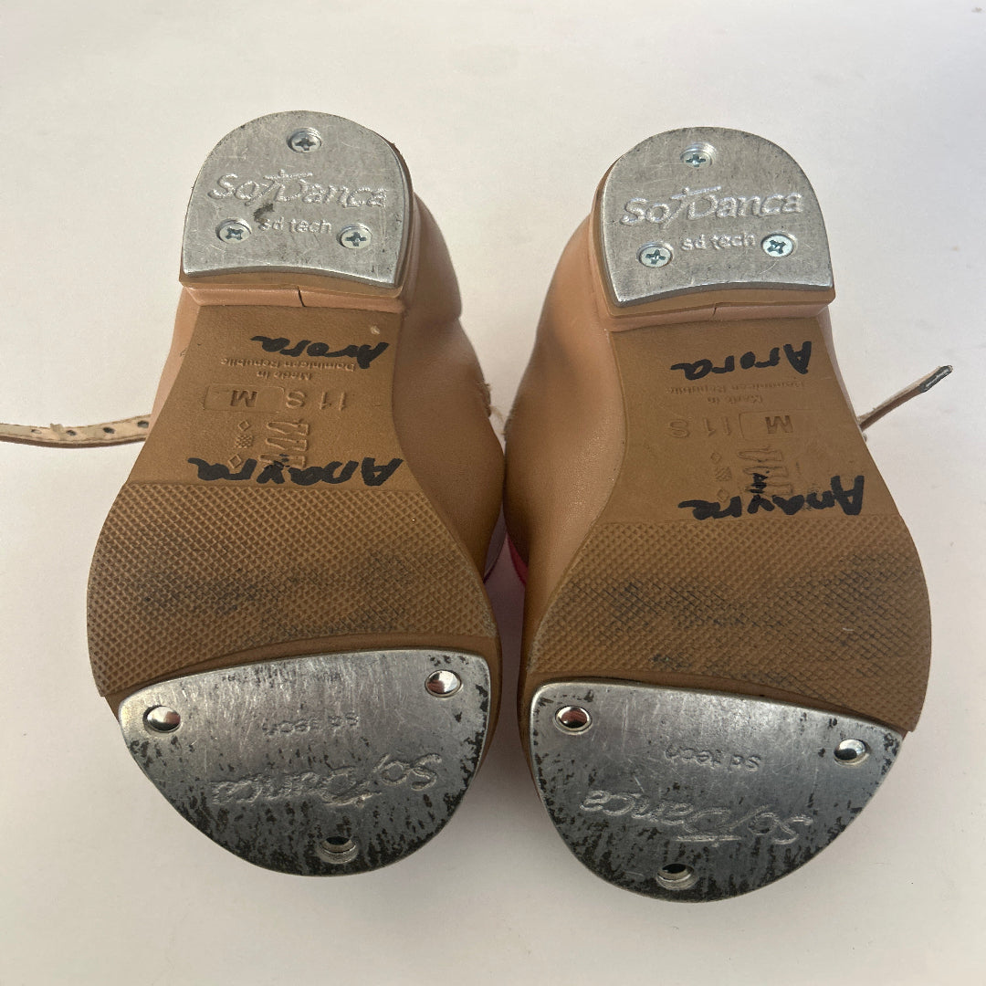 A pair of So Danca tan tap shoes, from the bottom view