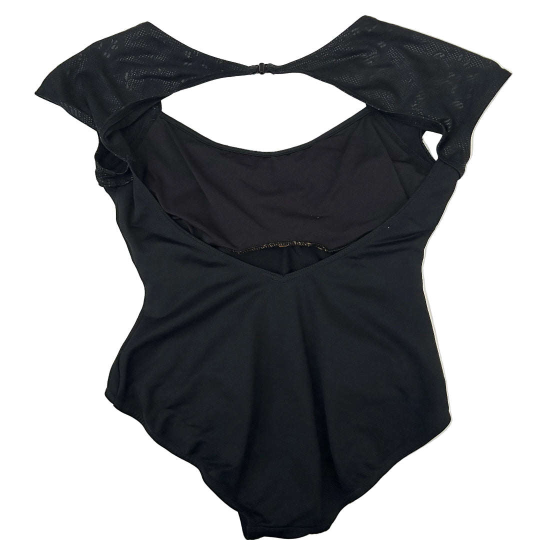 Rear view of a black leotard with short cap sleeves, featuring a textured panel on the upper shoulders and a keyhole cutout at the back, laid flat on a white background.