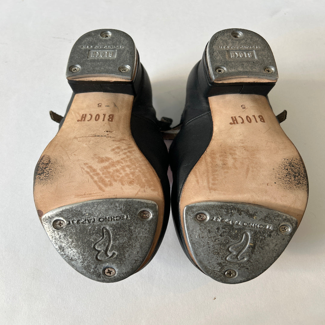 Bottom view of a pair of Bloch Black Buckle Tap Shoes 
