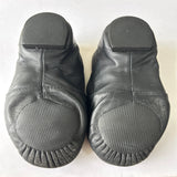 Rear view of a pair of second hand black jazz shoes