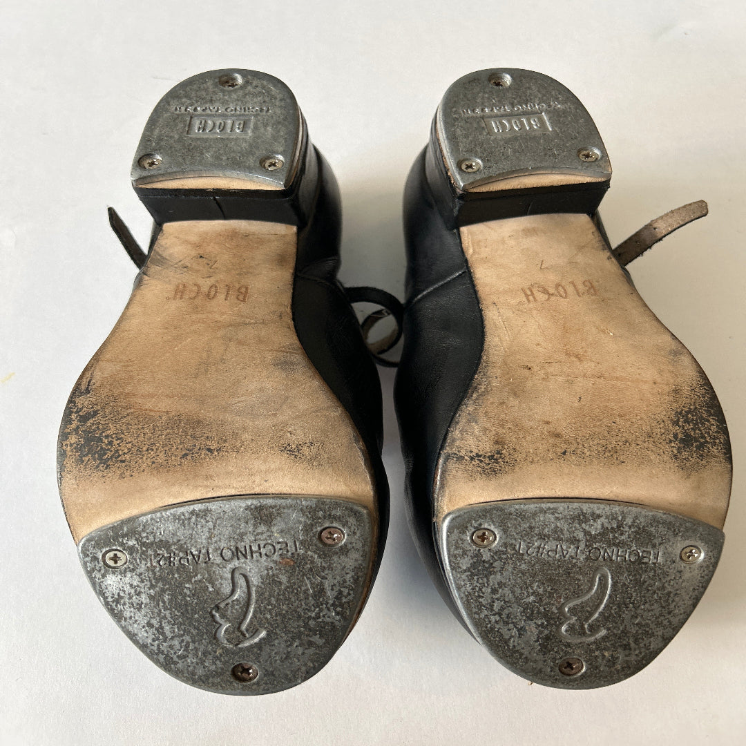 Bottom view of a pair of Black Bloch Buckle Tap Shoes